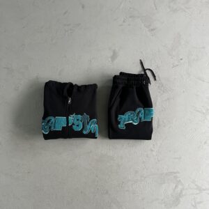 Chandal Trapstar largo negro y turquesa